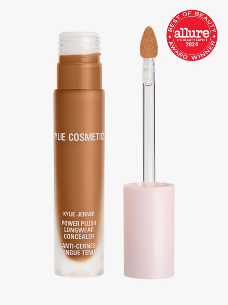 Kylie Cosmetics Power Plush Longwear Concealer branded twist up component with pink cap and white accents on a light gray background with red Allure Best of Beauty seal in the top right corner