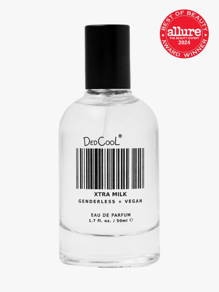 Dedcool Xtra Milk Fragrance branded bottle component with a black cap and black accents on a light gray background with red Allure Best of Beauty seal in the top right corner