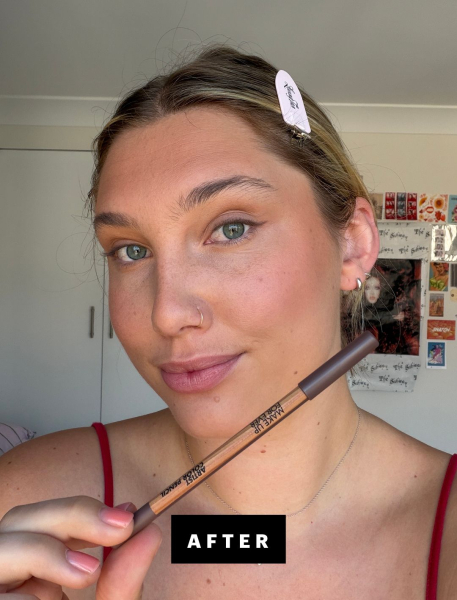 Katie Gunderman holding up eyeliner